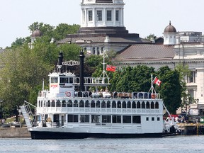 The Island Queen passes along the Kingston waterfront.