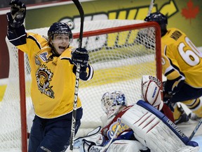 Edmonton Oil Kings goalie Laurent Brossoit (31) gets scored on by  Shawinigan Cataractes Yannick Veilleux during the first period at the Memorial Cup in Shawinigan Que., Thursday. A 6-1 loss eliminated the Oil Kings from the tournament.
Didier DeBusschere, QMI Agency
