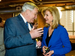 Conrad Black chats with Huffington Post founder Arianna Huffington during a  Huffington Post party. (ERNEST DOROSZUK, Toronto Sun)