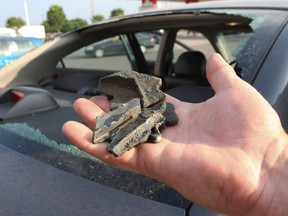 Debris which fell from an Air Canada jet is displayed on Monday. (STAN BEHAL, Toronto Sun)