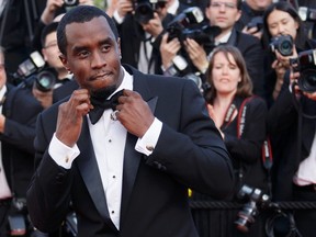 Musician and executive producer Sean "Diddy" Combs arrives on the red carpet for the screening of the film "Lawless",  in competition at the 65th Cannes Film Festival, May 19, 2012. (REUTERS/Yves Herman)