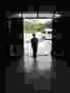 A child stands in the doorway at the Fountain of Life Children's Centre in Pattaya, Thailand, in May 2012. The facility is aimed at giving migrant children education and the tools to protect them on the street. (THANE BURNETT/QMI Agency)