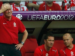 Poland's coach Franciszek Smuda reacts during their Euro 2012 Group A match against Greece at the National Stadium in Warsaw, June 8, 2012. (Kai Pfaffenbach/REUTERS)