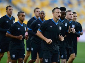 Players from England's national soccer team during practice at the Olympic stadium in Kiev, Ukraine, June 14, 2012. (NIGEL RODDIS/Reuters)