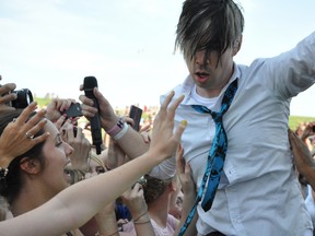 Marianas Trench frontman, Josh Ransay, flirt with fans during  well received performance. JASON MILLER/THE INTELLIGENCER/QMI AGENCY