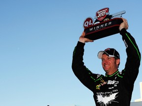 Dale Earnhardt Jr. celebrates winning the Quicken Loans 400 on Sunday. (GETTY IMAGES)