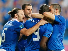 Italy's Mario Balotelli (2ndR) celebrates with teammates after scoring against Ireland. (REUTERS)