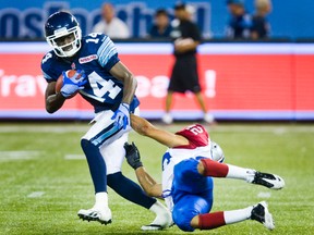 Argonauts wideout Chandler Williams does his best to stretch the field and his jersey yesterday during CFL exhibition play the Rogers Centre.