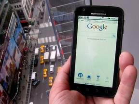 A posed picture shows a Motorola Droid phone displaying the Google search page in New York Aug. 15, 2011. REUTERS/Brendan McDermid