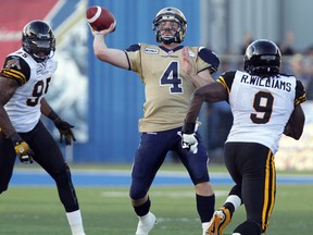 Bombers QB Buck Pierce throws against the Hamilton Tiger-Cats during Wednesday’s CFL pre-season game. The Bombers used much more of the hurry-up offence than they have in recent years. (JASON HALSTEAD/Winnipeg Sun)