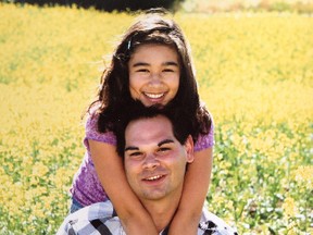 Brian Ilesic's family released a photo of the deceased man with his 12-year-old daughter Kiannah. Ilesic was killed in a multiple shooting and robbery during an early morning armoured car robbery at University of Alberta HUB Mall on June 15, 2012. (Family handout)