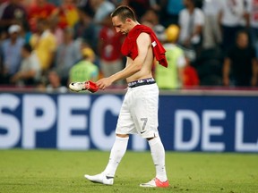 France winger Franck Ribery walks off the pitch after losing to Spain in the Euro 2012 quarterfinals at Donbass Arena in Donetsk, Ukraine, June 23, 2012. (CHARLES PLATIAU/Reuters)
