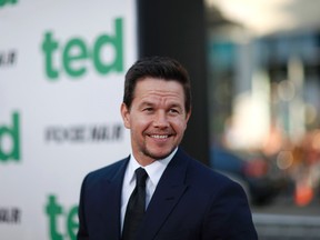 Cast member Mark Wahlberg poses at the premiere of "Ted" at the Grauman's Chinese theatre in Hollywood, California June 21, 2012. (REUTERS/Mario Anzuoni)
