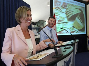 TTC chairman Karen Stintz and vice-chairman Glenn De Baeremaeker present the OneCity Transit Plan to the media at City Hall last month. (Craig Robertson/Toronto Sun file photo)