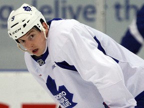 The Maple Leafs will buy out the final year of Colby Armstrong's contract. (DAVE ABEL/QMI Agency file photo)