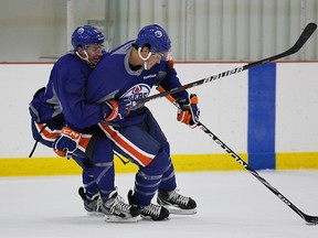 Dillon Simpson, right, is a big fan of free agent Justin Schultz. (Perry Nelson, Edmonton Sun).