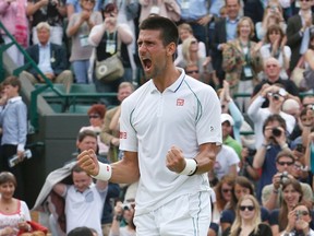 Novak Djokovic celebrates after defeating Florian Mayer in their quarterfinal Wimbledon match in London on Wednesday, July 4, 2012. (Suzanne Plunkett/Reuters)