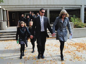 Brian Knight comes out of Red Deer Court of Queens Bench Friday afternoon, October 7, 2011, after being sentenced to 90 days in jail to be served on weekends. LISA JOY/LACOMBE GLOBE/QMI AGENCY