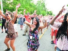 City politicians will discuss Monday creating "culture districts" to spread arts and entertainment across London, such as this Sunfest celebration in Victoria Park.