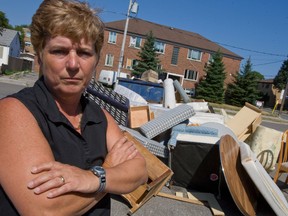 Donna Wilkinson says she and other residents of a cozy East York street are upset with a building on St. Clair Ave. E. that garbage pile on the street corner that sits for a month before it's picked up. (Dave Thomas/Toronto Sun)