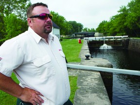 Rich Fowlie, one of the lock operators for the Merrickville Lock Station, stands beside the locks. MP Gord Brown has announced a public consultation meeting on Rideau Canal service levels  as Parks Canada warns to expect a second wave of layoffs.
(THOMAS LEE/Recorder And Times file photo)
