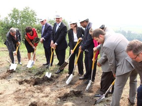 Dignitaries take part in the soil turning ceremony to kick off the final leg of construction of Anthony Henday Drive. DAVE LAZZARINO/EDMONTON SUN QMI AGENCY