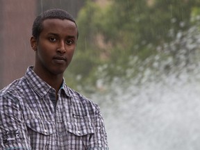 Bashir Mohamed, 17, poses for a photo outside of Edmonton City Hall in Churchill Square on July 15, 2012. (IAN KUCERAK/QMI Agency)