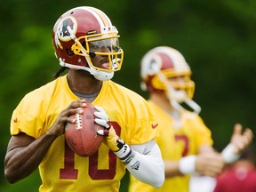 Redskins quarterback Robert Griffin III inked a four-year deal on Wednesday, July 18, 2012. (Jonathan Ernst/Reuters)