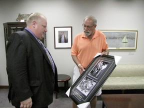 Mayor Rob Ford meets Toronto Maple Leafs legend Eddie Shack in his office at City Hall on Wednesday, July 18, 2012. Shack presented Ford with a signed picture of him from when the Leafs won the Stanley Cup. (Don Peat/Toronto Sun)