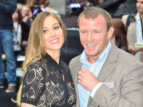 Guy Ritchie with girlfriend