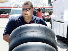 Craig Fairchild delivers Goodyear tires for the NASCAR Canadian Tire Series teams at the Edmonton Indy on Friday June 20, 2012. TOM BRAID EDMONTON SUN QMI AGENCY
