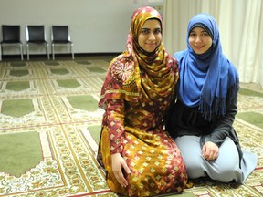 Saba Ali, 22 (left), and Marwa Elkelani, 20, prepare for night prayers at the Sarnia Mosque following 'iftar' (breaking fast meal) on their first full day of fasting in the Islamic month of Ramadan. (file photo)