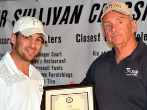 Timmins native Steve Sullivan reached the 1,000th career regular-season games milestone on Thursday night in Nashville where the Phoenix Coyotes defeated the Predators 7-4. In this file photo, Sullivan poses with Timmins' mayor Tom Laughren at the Hollinger Golf Course after he was presented with a plaque prior to the start of the Lever/Sullivan Classic Invitational Golf Tournament. The plaque commemorated the raising of a billboard in Sullivan's honour.