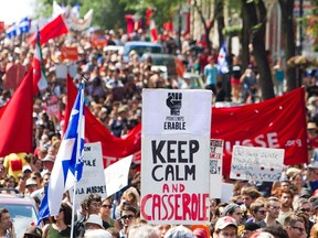 Thousands of demonstrators march against student tuition hikes and Bill 78 in downtown Montreal, Quebec July 22, 2012.  (Olivier Jean/REUTERS)