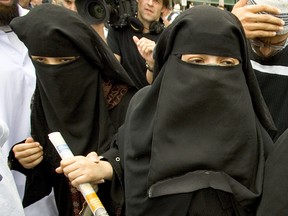 Nowhere in the Qur’an does it state that burkas or hijabs are mandatory religious practice. (QMI Agency files)