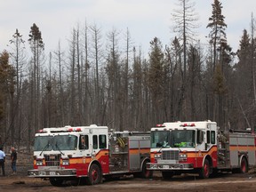 Ottawa firefighters on scene at the brush fire on Moodie Drive in Ottawa Sunday July 15, 2012. (QMI AGENCY/Tony Caldwell)