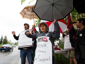 Workers demonstrate outside Park Place’s Hardisty Care Centre in Edmonton recently. (EDMONTON SUN/File)