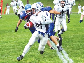 BEN LEESON The Sudbury Star
Sudbury Spartans receiver Nick Micelotta runs the ball during Northern Football Conference action against the Ottawa Invaders at Queen's Athletic Field earlier this season. Sudbury hosts the Sault Steelers on Saturday at 7:15 p.m.