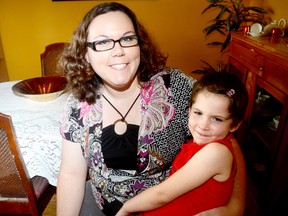 Brianna Warrhunter and her daughter Ruby an their Trenton home Monday, July 30, 2012. (EMILY MOUNTNEY/QMI AGENCY)
