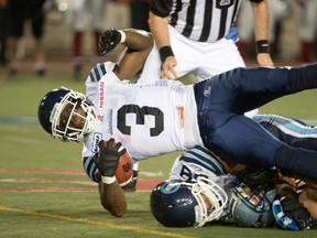 Argos running back Cory Boyd gets taken down against the Alouettes on Friday. Boyd may lead the league in running, but needs to become more of a factor in the Boatmen’s offence. He gained just 55 yards on the ground against the Als.