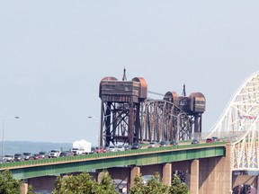 Cars wait for clearance at customs at the International Bridge
