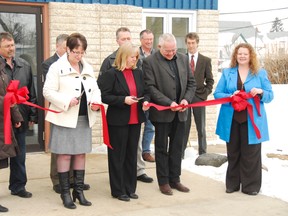 Officials with the Town of Gladstone and surrounding rural municipalities cut the ribbon to officially open the new town hall in Gladstone in 2010. Currently, the RM of Westbourne Reeve David Single and Town of Gladstone Mayor Eileen Clarke have opposing views on amalgamation. (File photo)