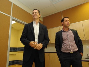 Premier Dalton McGuinty (left) and Sault MPP David Orazietti (right) tour St. Francis French Immersion Catholic School in Sault Ste. Marie, Ont. on Tuesday, Aug. 7, 2012.