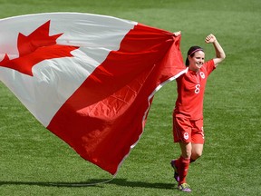 Diana Matheson of Canada celebrates their 1-0 win over France to win the women's Bronze medal soccer match at the London 2012 Olympic Games.  Matheson scored the winning goal in injury time on Thursday. (AL CHAREST/QMI AGENCY)
