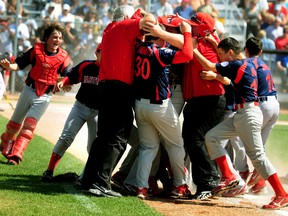 The Hastings All Stars celebrate capturing the 2012 Little League Canadian Championship after they downed the Lethbridge Southwest All Stars 11-1 after four innings at John Fry Park  in Edmonton on Saturday.
Trevor Robb, QMI Agency
