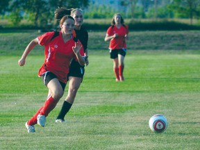 Courtney Nichol of the Portage Blaze tracks the ball during a 5-1 win over the Heat at Republic of Manitobah Park on Monday night. (Dan Falloon/Portage Daily Graphic)