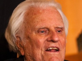 Billy Graham attends a book signing at the Billy Graham Library in Charlotte, North Carolina in this Dec. 20, 2010 file photo.  REUTERS/Chris Keane/Files