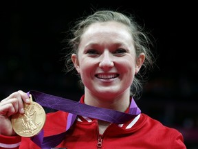 Rosannagh MacLennan celebrates with her gold medal after the women's trampoline final of the artistic gymnastics event of the London 2012 Olympic Games. (THOMAS COEX/AFP files)
