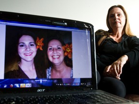 Wendy Yurko poses in her home with pictures of her slain daughter, Dana Turner, in Fort Saskatchewan on Thursday, March 15, 2012. (CODIE MCLACHLAN/ QMI AGENCY)