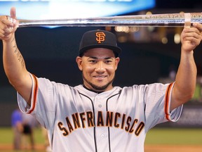 Giants outfielder Melky Cabrera will miss the rest of the regular season after Major League Baseball suspended him 50 games for using a performance-enhancing drug. (Jeff Haynes/Reuters/Files)